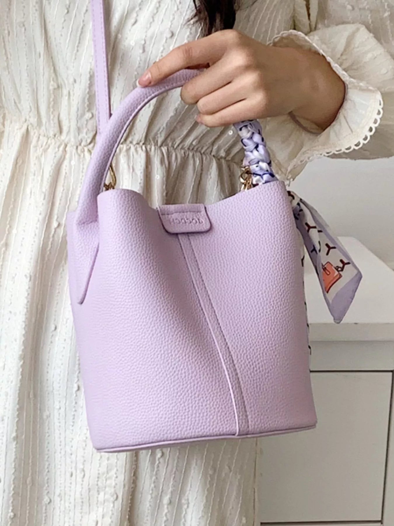 HOORR Scarf Bag in purple, a bucket bag with an attached scarf accent